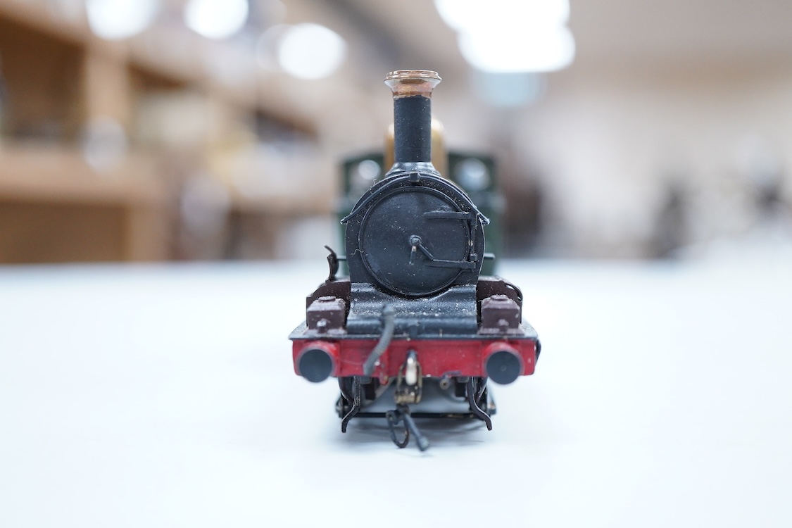 A narrow gauge scratch built model railway locomotive running on 32mm track by John Worsley, a Ruston 0-4-0 diesel shunter, 7, a detailed model with sprung buffers, etc. and fitted with a Mashima 12v dc motor, for two ra
